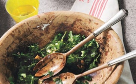 Arugula Salad with Caramelized Onions, Goat Cheese, and Candied Walnuts