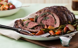 Arugula-Stuffed Leg of Lamb with Roasted Spring Vegetables